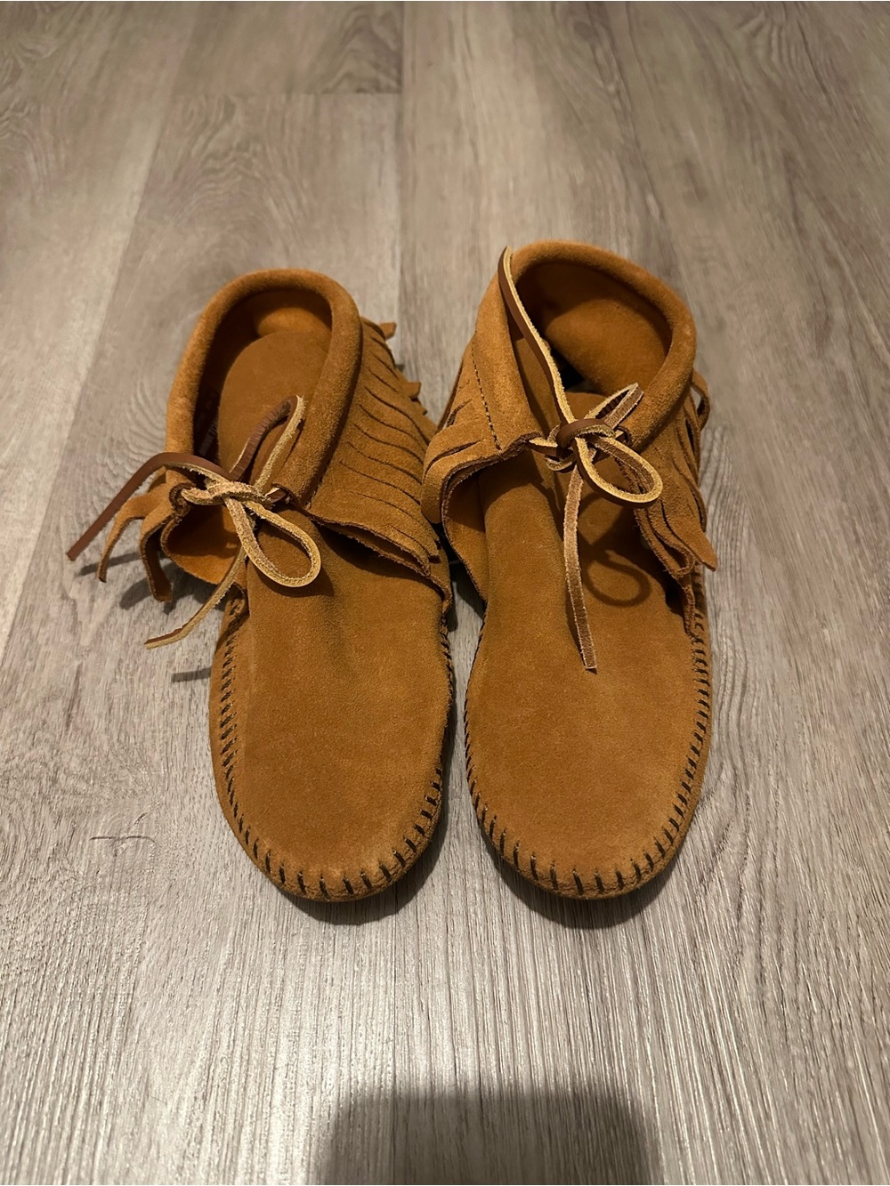 Women’s Minnetonka Suede Fringe Moccasin Boots in Brown